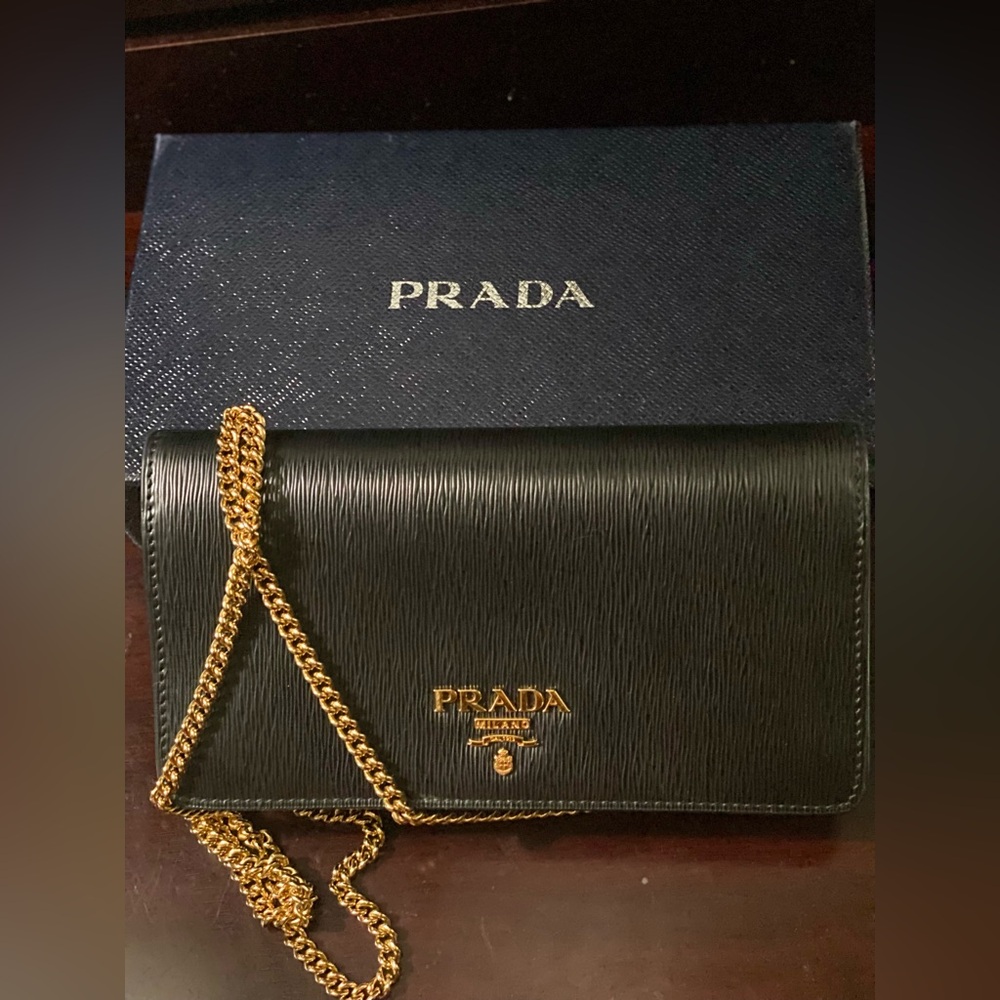 PRADA
Vitello Move Leather Clutch